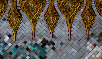 Abstract pattern of Thai traditional style in temple with mosaic background.