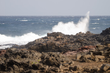 Wave breaking against the shore. El Confital. La Isleta Protected Landscape. Las Palmas de Gran Canaria. Gran Canaria. Canary Islands. Spain.