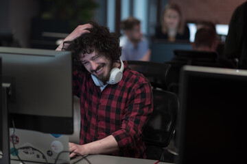 Disappointed businessman wearing headset having virtual team meeting group call chatting with diverse people in customer support. Video conference call on computer with manager and employees.