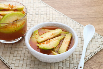 Asinan Kedondong (pickled fruit), a traditional Indonesian cuisine made from preserved tropical fruits. Spicy, sweet and sour taste.
