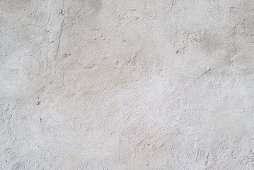 Texture background of uneven, rough concrete gray wall. Cement blank backdrop