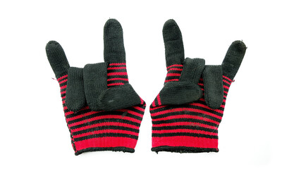 The love sign showing by old fabric knitted gloves on white background
