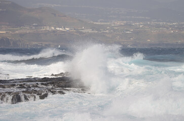 Waves breaking against the shore. El Confital. La Isleta Protected Landscape. Las Palmas de Gran Canaria. Gran Canaria. Canary Islands. Spain.
