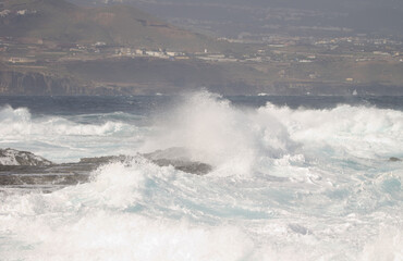 Waves breaking against the shore. El Confital. La Isleta Protected Landscape. Las Palmas de Gran Canaria. Gran Canaria. Canary Islands. Spain.