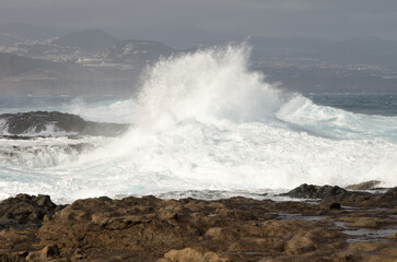 Waves breaking against the shore. El Confital. La Isleta Protected Landscape. Las Palmas de Gran Canaria. Gran Canaria. Canary Islands. Spain.