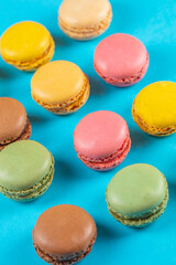 Close-up of macarons cakes of different colors .Culinary and cooking concept. Tasty colorful macaroons.