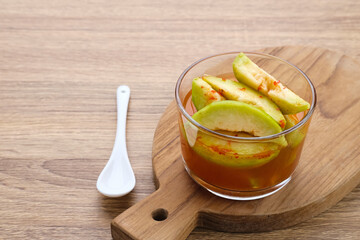 Asinan Kedondong (pickled fruit), a traditional Indonesian cuisine made from preserved tropical fruits. Spicy, sweet and sour taste.
