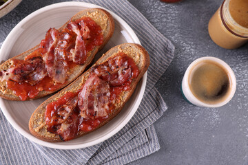 Sandwiches with peanut butter, strawberry jam and bacon