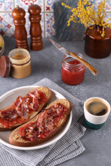 Sandwiches with peanut butter, strawberry jam and bacon