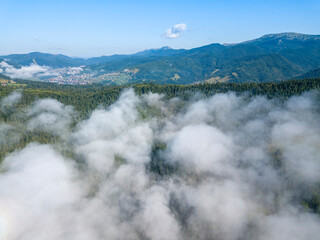 Morning fog in the Ukrainian Carpathians. Aerial drone view.