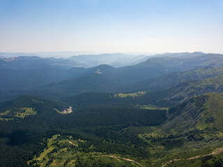 Naklejka premium High mountains of the Ukrainian Carpathians in cloudy weather. Aerial drone view.