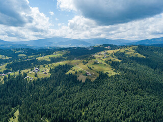 Naklejka premium Green Ukrainian Carpathians mountains in summer. Aerial drone view.
