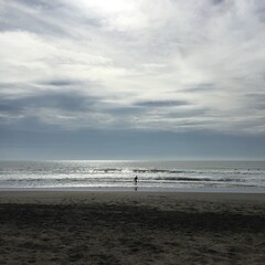 surfer heading into the beach, Nakasato beach, Chiba Japan