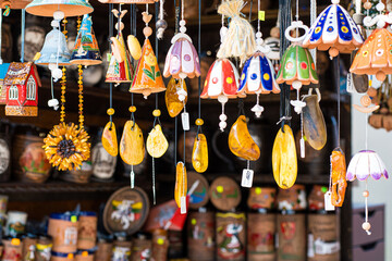 Necklaces and other amber souvenirs. Amber of different colors and sizes. Exposition of stones of...