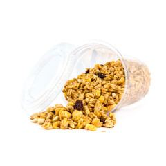 bowl of crispy muesli with raisins on isolated white background