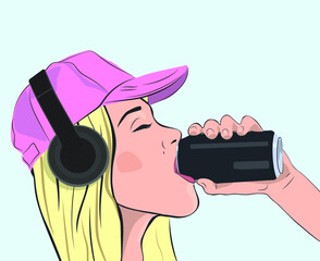 A young blonde girl in headphones drinks soda from a can. - 493618085