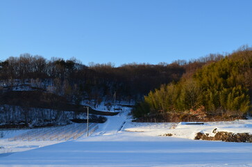 Fototapeta na wymiar 日本の冬の田舎風景