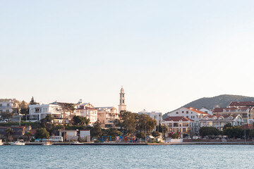 Dat&ccedil;a Peninsula in Turkey. Blue sea. Coastal area. Green trees, white houses and boots. City view. 