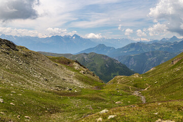 Fototapeta na wymiar Summer trekking day in the mountains over Valtournanche