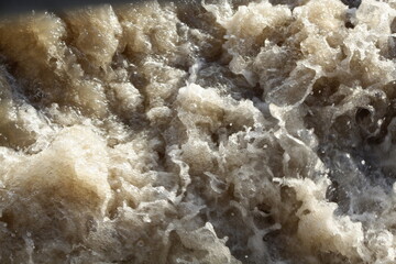 water flowing in the dam water flowing with pressure in the dam