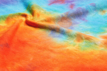 Abstract tie dye multicolor folded fabric cloth Boho pattern texture for background or groovy...