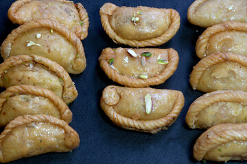 Indian sweet Gujia is a sweet deep-fried dumpling made during holi festival