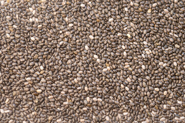 Texture black seeds chia or Salvia hispanica .