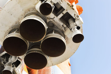 Space rocket engine close-ups on a blue sky background
