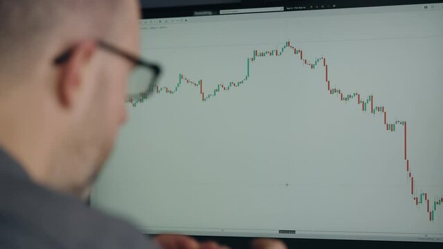 A trader in depression due to a fall in the stock market or crypto currency. Stock market risks.