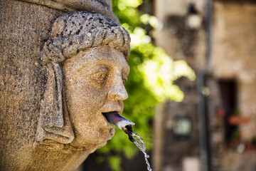 Water Fountain on the Old Marketplace in the Beautiful Medieval Village of Vaison la Romaine, Provence, France - obrazy, fototapety, plakaty