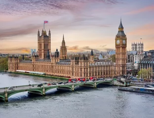 Tuinposter London cityscape with Houses of Parliament and Big Ben tower at sunset, UK © Mistervlad
