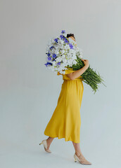 Bouquet of stylish flowers. Romantic composition with pink flowers. Pastel plants composition