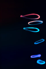 Colored smoke on black background	