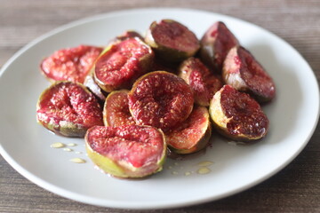 Roasted Fig halves served with a drizzle of honey