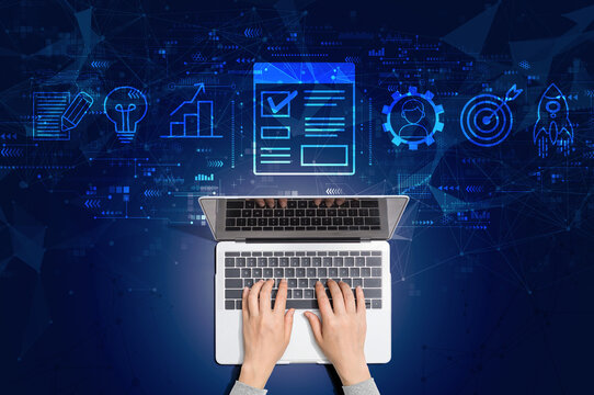 Project management theme with person using a laptop computer