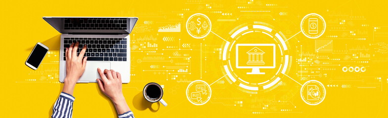 Cryptocurrency fintech theme with person using a laptop computer