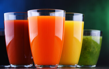 Glasses with fresh organic vegetable and fruit juices