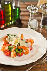 Salad with seafood, squid and shrimp. food photography, dark background