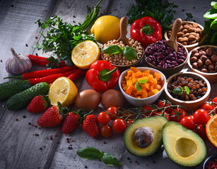 Obraz na płótnie Canvas Assorted organic food products on the table