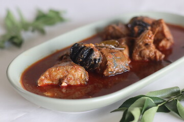Mackerel curry prepared in central Kerala style with red chilies and Malabar tamarind