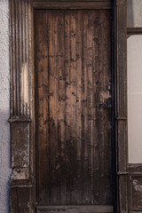 Garmisch-Partenkirchen, Germany - December 20,2021: Old Main Entrance Wooden Door.


