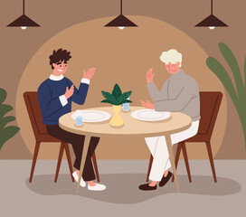 people sitting at the table in restaurant