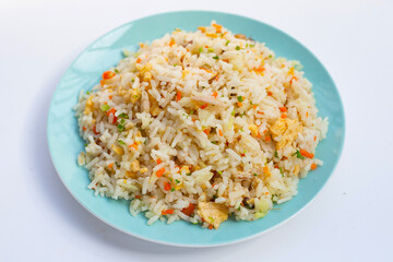Crab fried rice in blue plate on white background