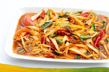 Spicy papaya salad with pickled shells