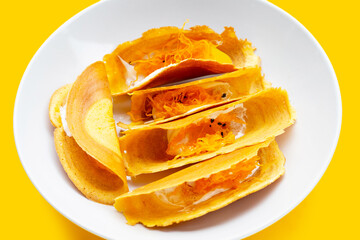 Thai crispy pancakes on white background.