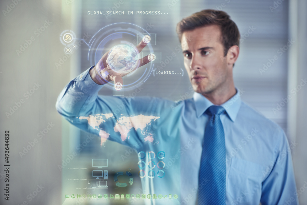 Poster digital tools for the modern businessman. cropped shot of a handsome young businessman using a digit