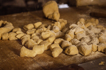 hands kneading gnocchi, Woman working with dough