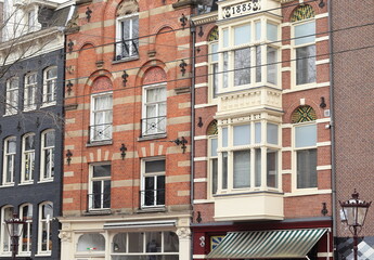 Amsterdam Nieuwezijds Voorburgwal Street Brick House Facades Close Up, Netherlands