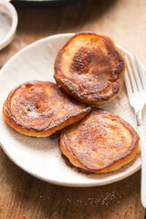 Pancakes with apples, cinnamon and icing sugar 