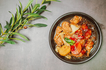 Andongjjimdak, Korean Braised Chicken : To make this dish, chicken is cut into pieces and braised with carrot, potato, and other vegetables, along with a soy sauce-based seasoning. Glass noodles can b